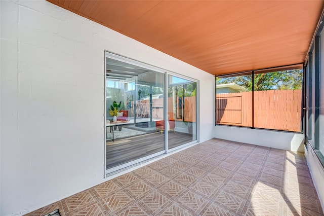 view of unfurnished sunroom