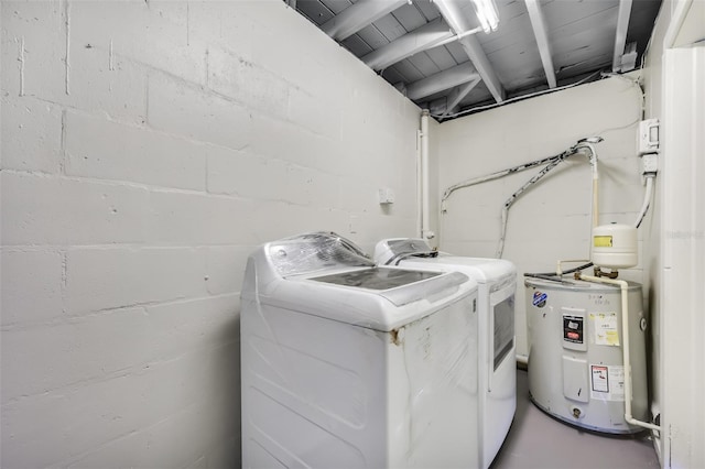 laundry room featuring washing machine and clothes dryer, water heater, and wooden ceiling