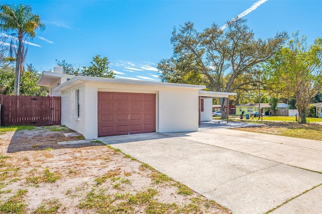 ranch-style house featuring a garage