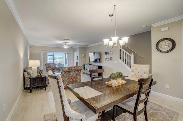 dining room featuring visible vents, ornamental molding, light wood-style flooring, and baseboards