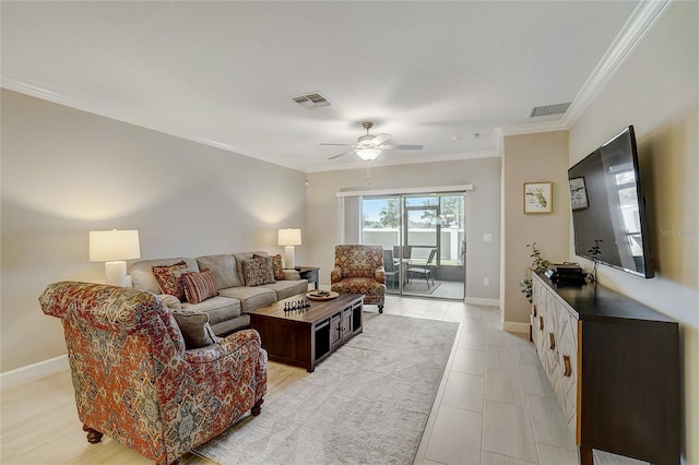 living area featuring baseboards, visible vents, ceiling fan, and crown molding