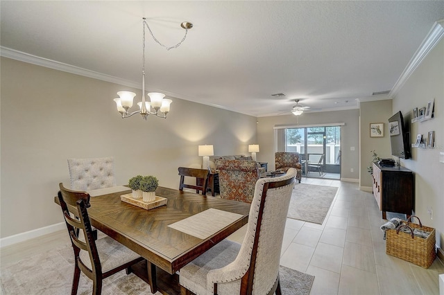 dining space with ornamental molding, visible vents, and baseboards