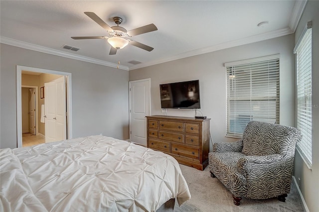 bedroom featuring a ceiling fan, visible vents, crown molding, and light colored carpet