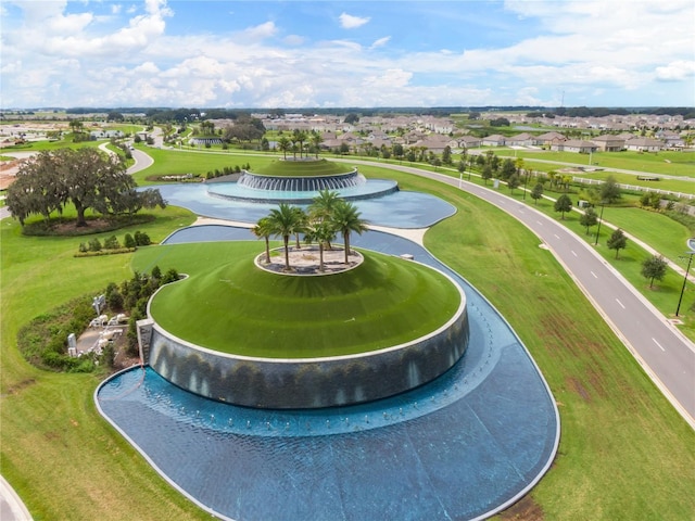 birds eye view of property with a residential view