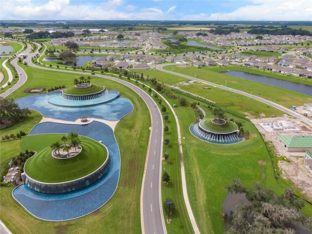 aerial view featuring a residential view and a water view