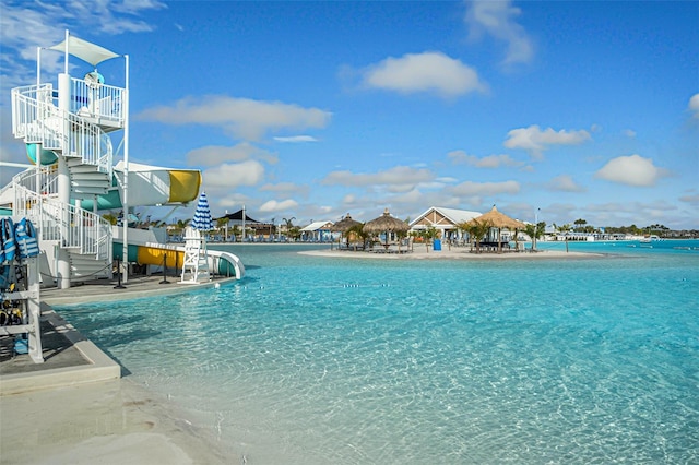 view of pool featuring stairway