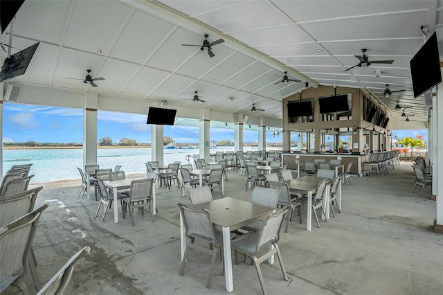 view of patio / terrace featuring outdoor dining space and a ceiling fan