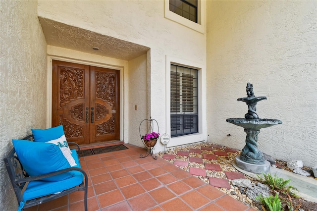 view of exterior entry with french doors