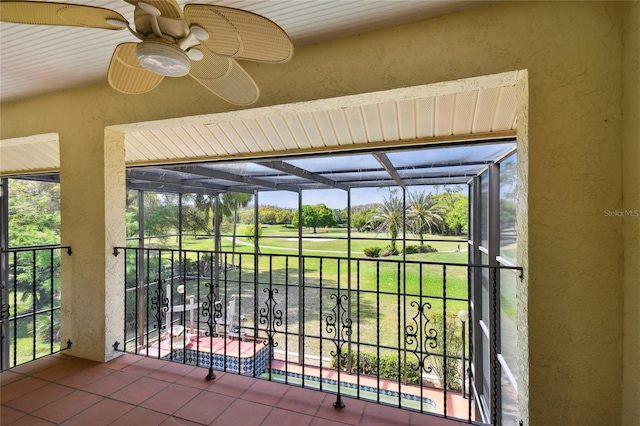 exterior space featuring ceiling fan