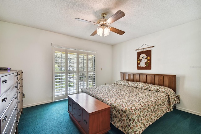 bedroom featuring access to exterior, ceiling fan, dark carpet, and a textured ceiling