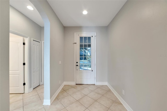 foyer featuring light tile patterned floors