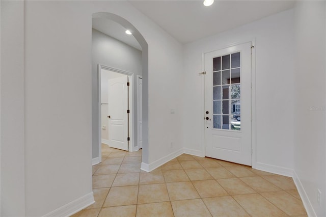 entrance foyer featuring light tile patterned floors