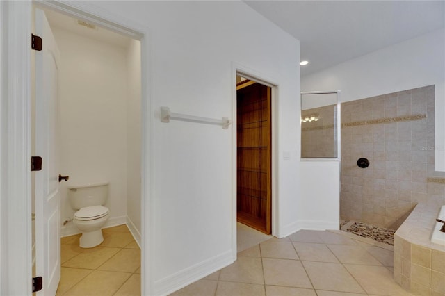 bathroom with tile patterned flooring, separate shower and tub, and toilet