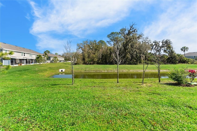 view of yard featuring a water view