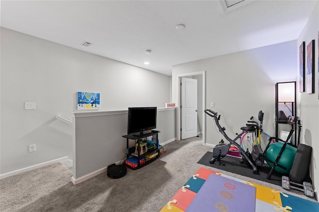 workout area featuring carpet