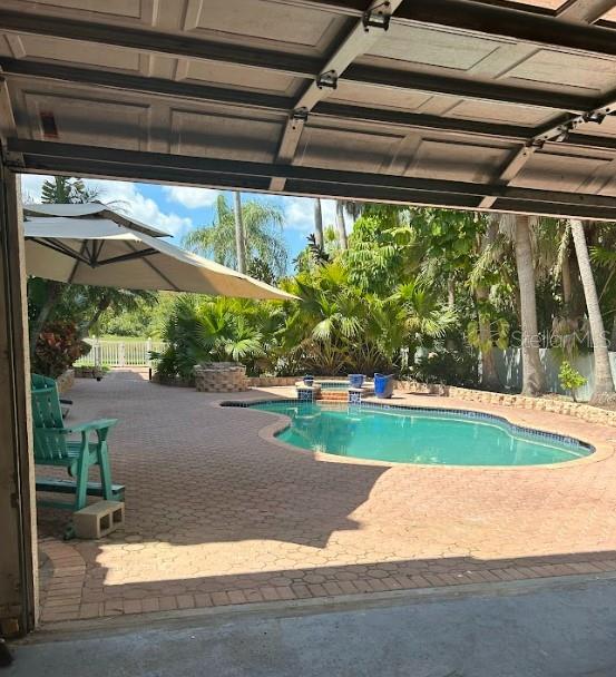 view of pool with a patio