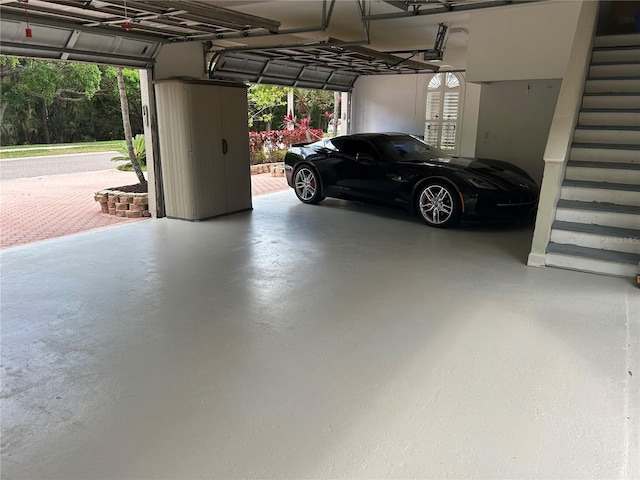 garage featuring a garage door opener