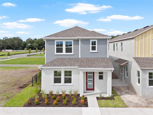 front of property featuring a front lawn