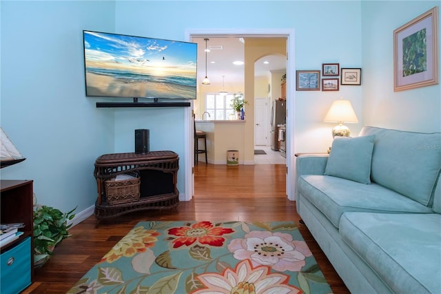 living room featuring dark hardwood / wood-style floors