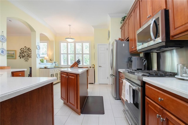 kitchen with backsplash, stainless steel appliances, light tile floors, a center island, and pendant lighting