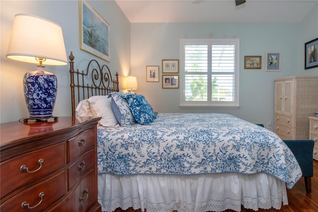 bedroom featuring dark wood-type flooring