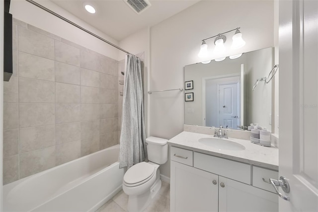 full bathroom with tile floors, oversized vanity, shower / bath combo with shower curtain, and toilet