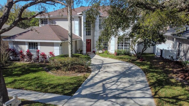 view of front of house featuring a front lawn