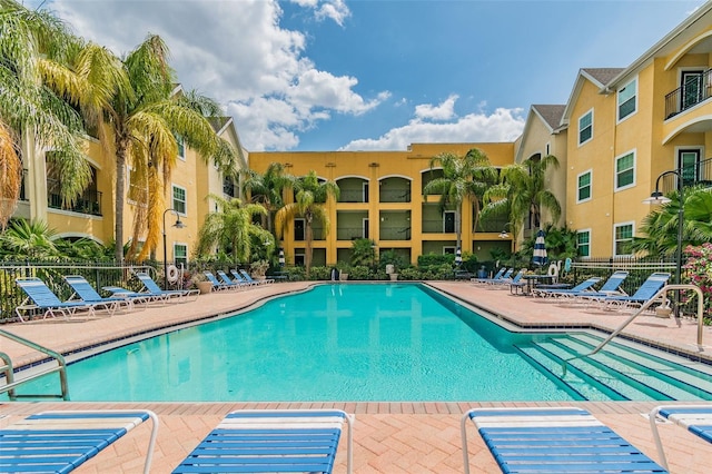 view of swimming pool with a patio area