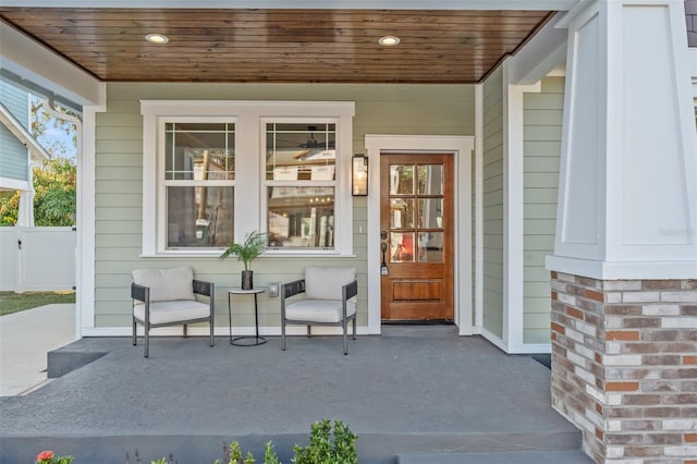 property entrance featuring a porch