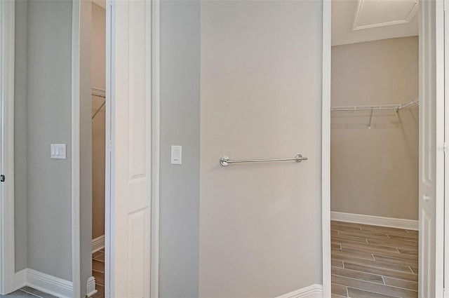 bathroom with hardwood / wood-style floors