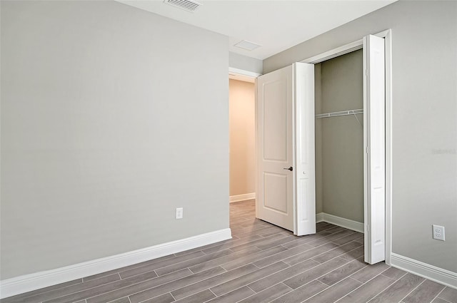 unfurnished bedroom featuring a closet