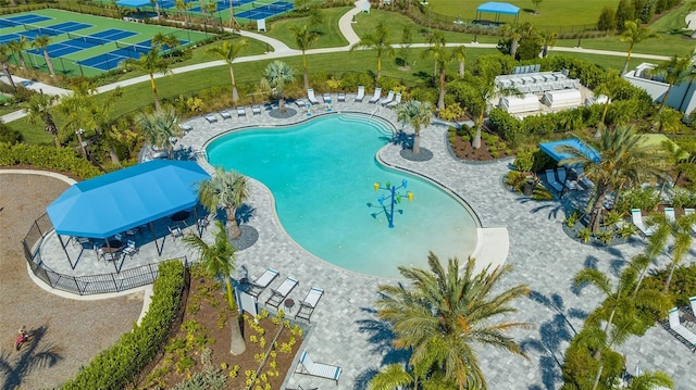 view of swimming pool featuring a patio area