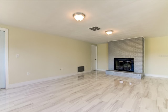 unfurnished living room featuring a fireplace