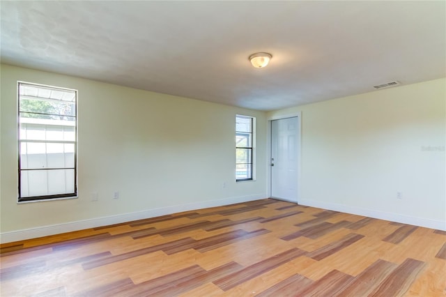 empty room with light wood-type flooring