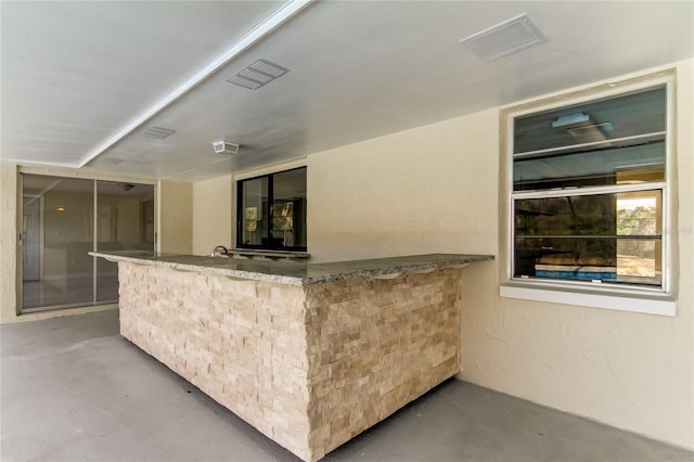 bar with concrete floors