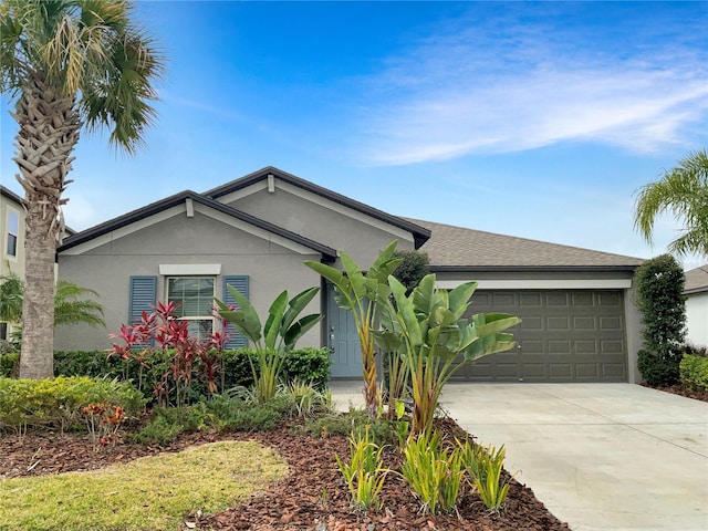 single story home featuring a garage