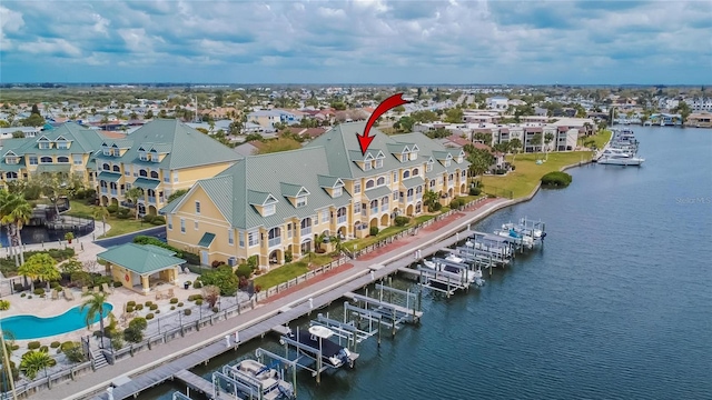 birds eye view of property featuring a water view