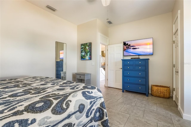 bedroom with light tile patterned flooring