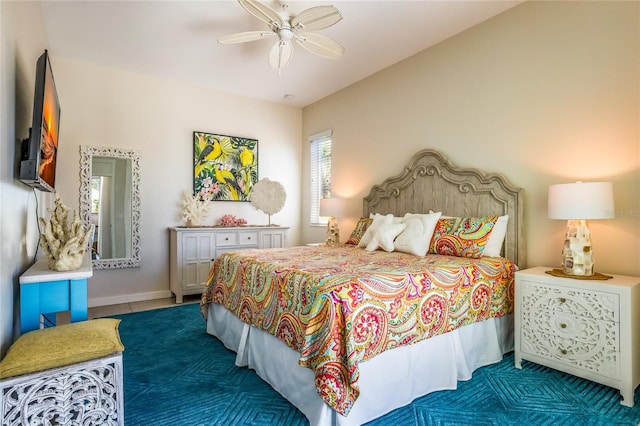 tiled bedroom featuring ceiling fan