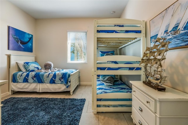 bedroom with light tile patterned flooring