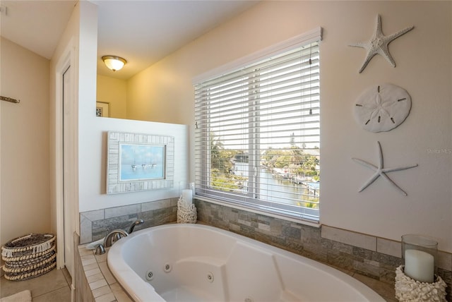 bathroom featuring tiled tub