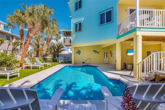 view of pool featuring a patio