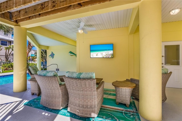 view of patio with ceiling fan