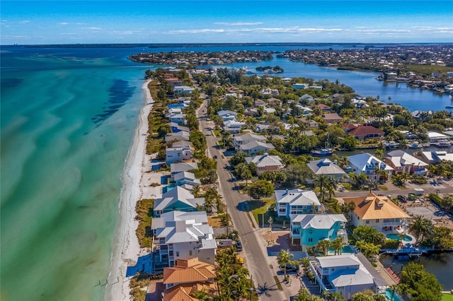 bird's eye view featuring a beach view and a water view