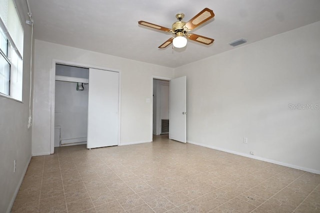 unfurnished bedroom featuring a closet, ceiling fan, and light tile flooring