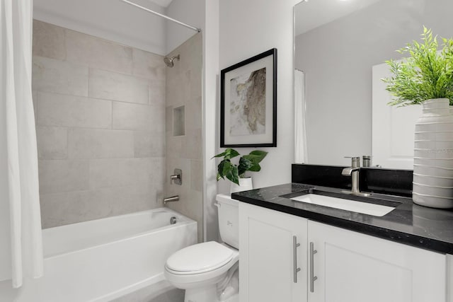 full bathroom featuring vanity, toilet, and shower / bath combo