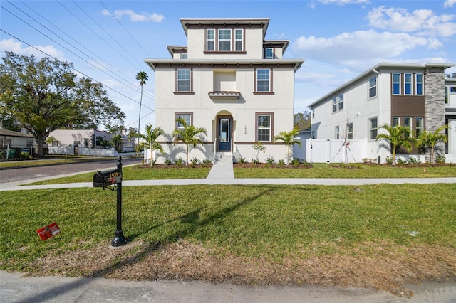 view of front facade featuring a front yard