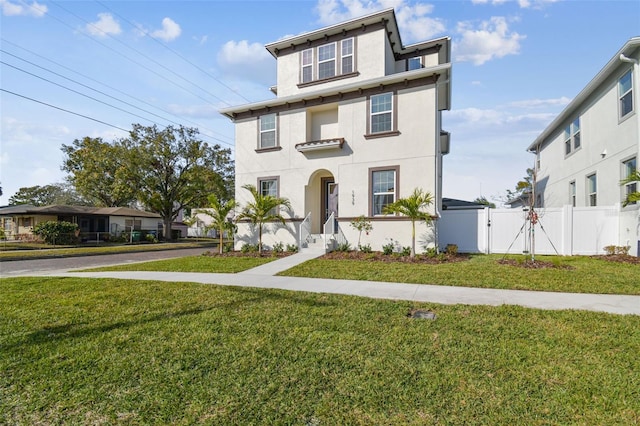 view of front facade with a front lawn