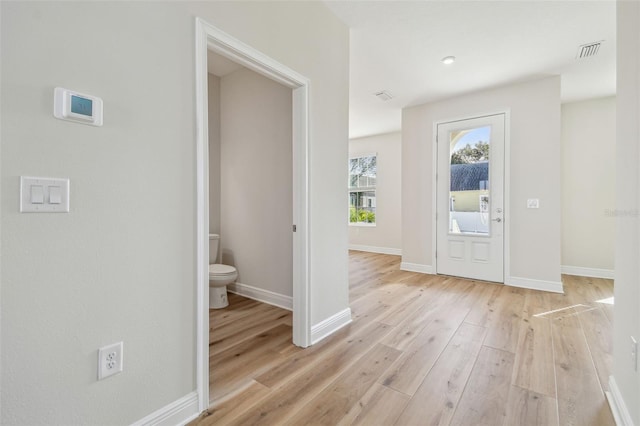 entrance foyer with light wood-type flooring