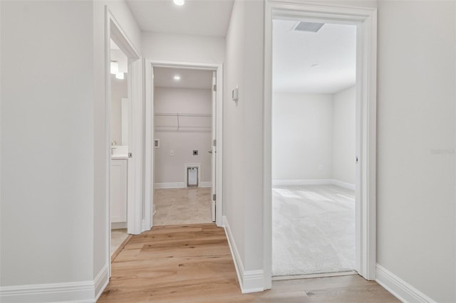 hall featuring light wood-type flooring